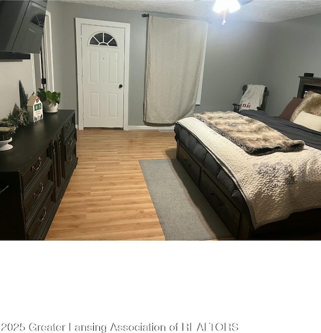 bedroom with light wood-type flooring