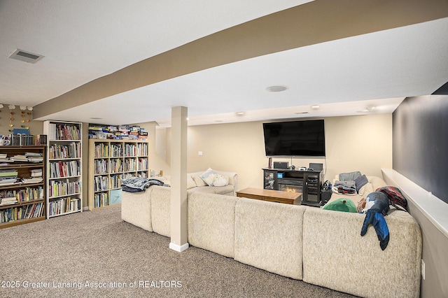 living room featuring visible vents and carpet flooring