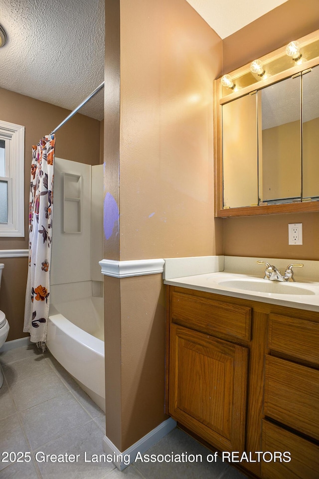 full bath with shower / bath combination with curtain, toilet, vanity, a textured ceiling, and tile patterned flooring