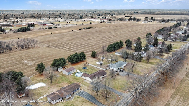 birds eye view of property featuring a rural view