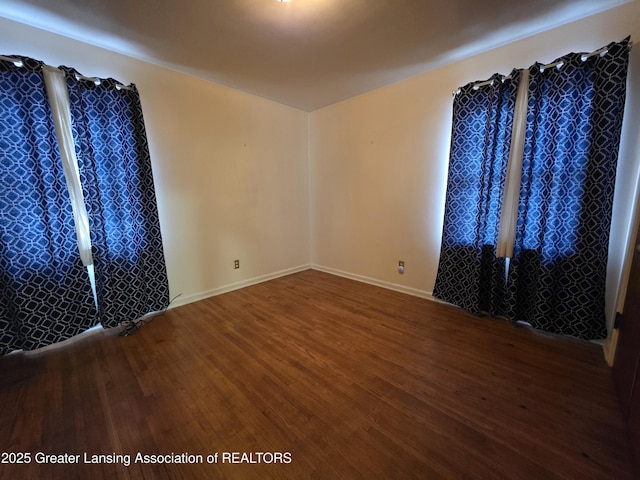 empty room featuring wood finished floors