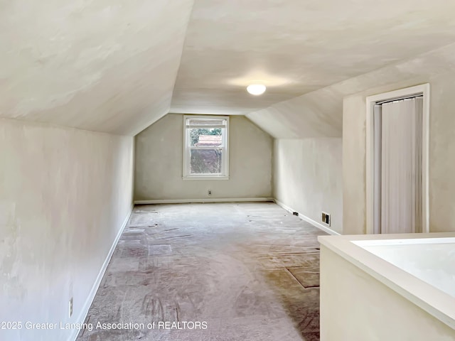 bonus room with vaulted ceiling