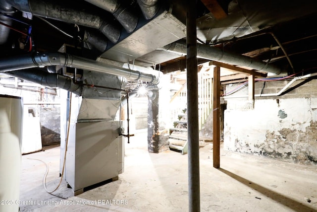 unfinished basement with heating unit