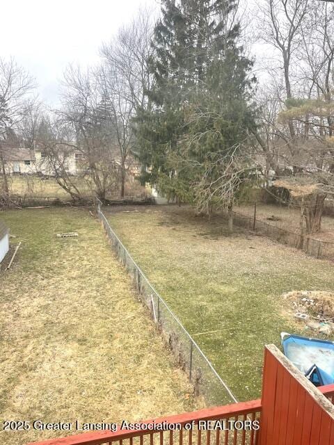 view of yard featuring fence