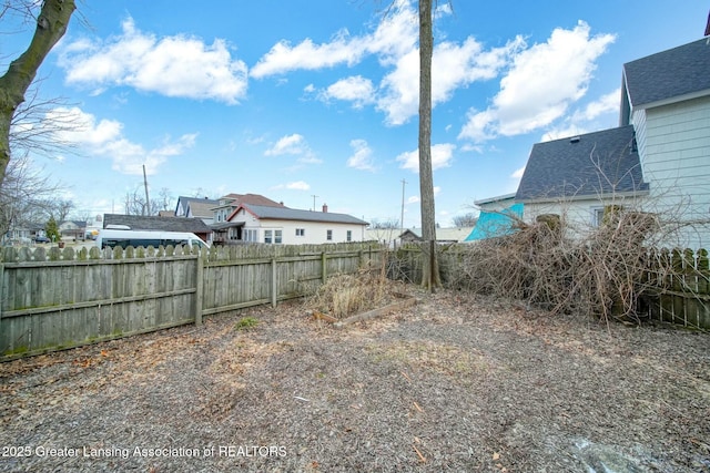 view of yard featuring fence