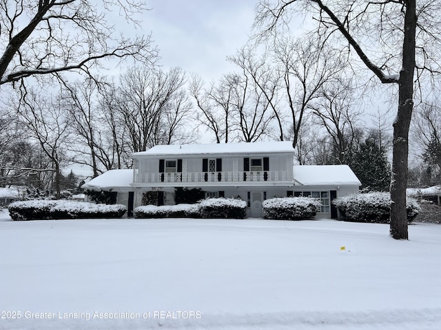 view of front of house with a balcony