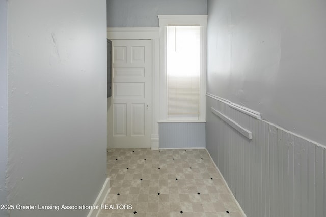 spacious closet with tile patterned floors