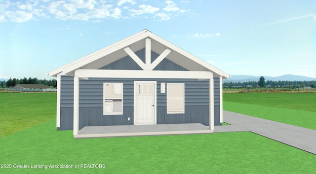 view of outbuilding featuring a mountain view