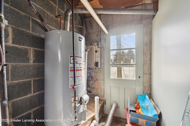 utility room with gas water heater