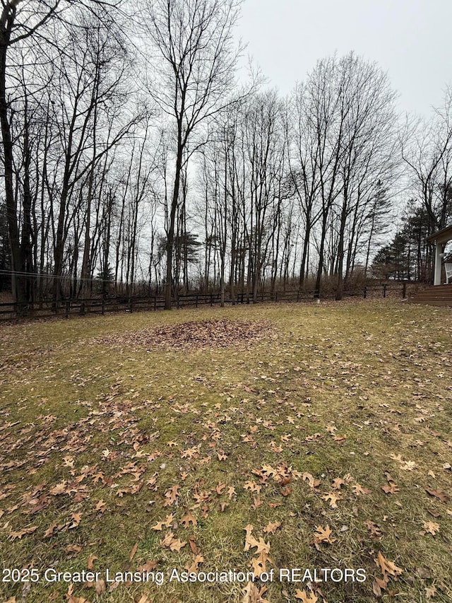 view of yard with fence