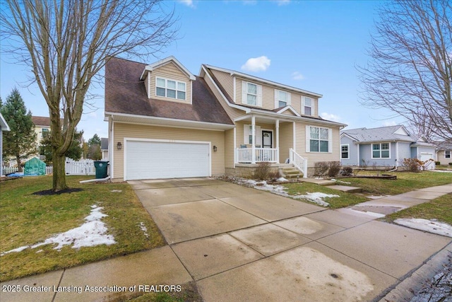 traditional-style home featuring a garage, concrete driveway, fence, a porch, and a front yard