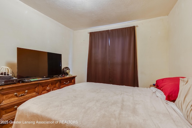 bedroom with a textured ceiling