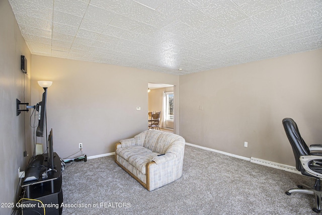 office area featuring carpet and baseboards