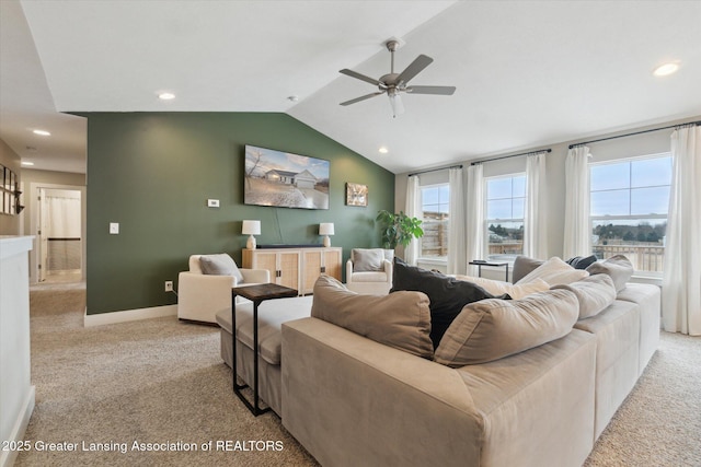 living area featuring recessed lighting, baseboards, vaulted ceiling, and light colored carpet