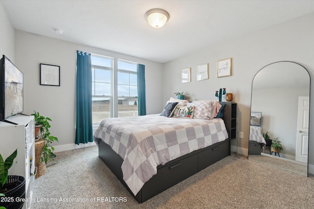 bedroom featuring baseboards