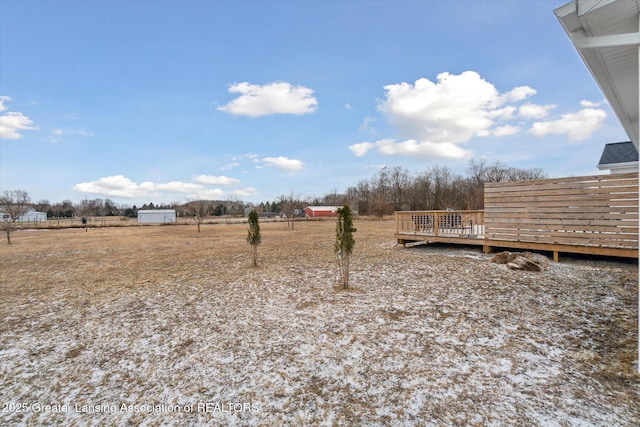 view of yard with a deck