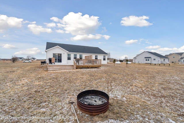 rear view of house with a deck