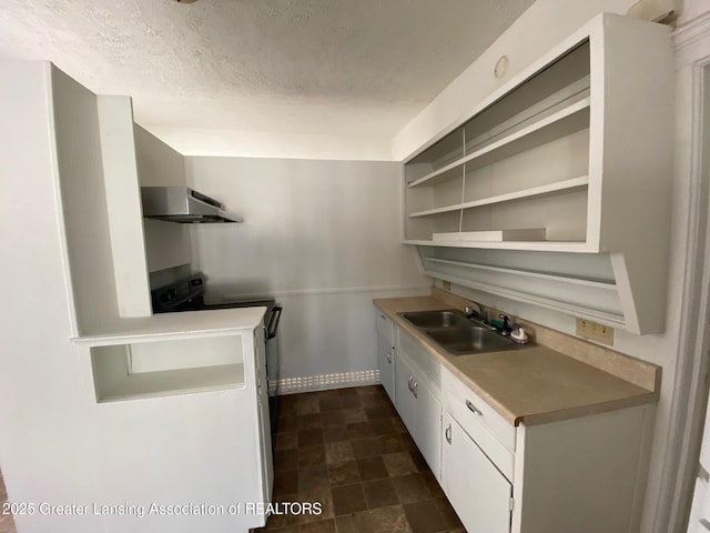 kitchen featuring a sink, range hood, white cabinets, a textured ceiling, and open shelves