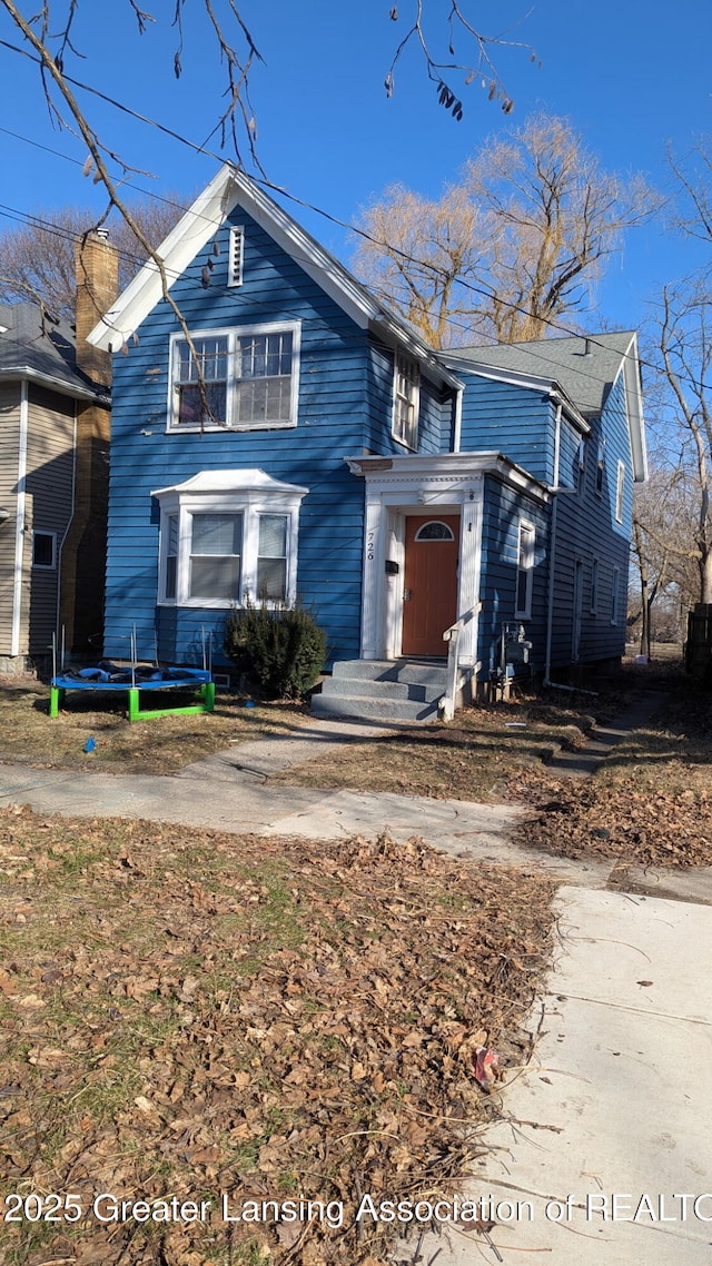 traditional-style house with a trampoline