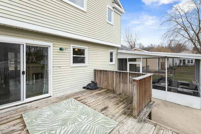 deck with a sunroom