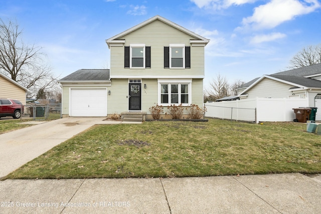 colonial house featuring concrete driveway, an attached garage, fence, and a front lawn