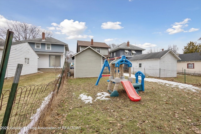 view of jungle gym with fence