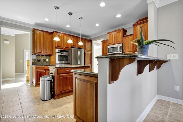 kitchen with brown cabinets, backsplash, stainless steel appliances, a peninsula, and crown molding