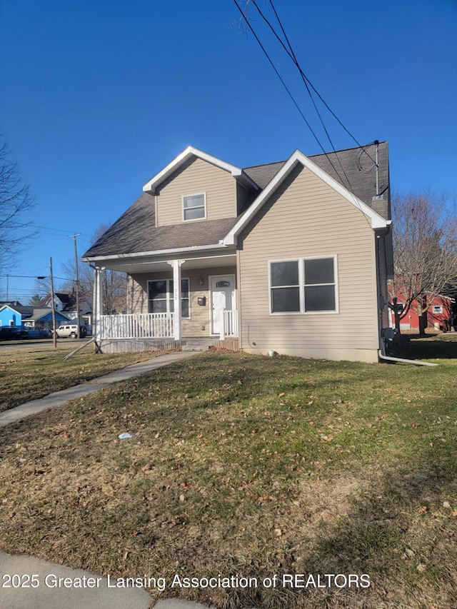 view of front of house featuring a front lawn and a porch