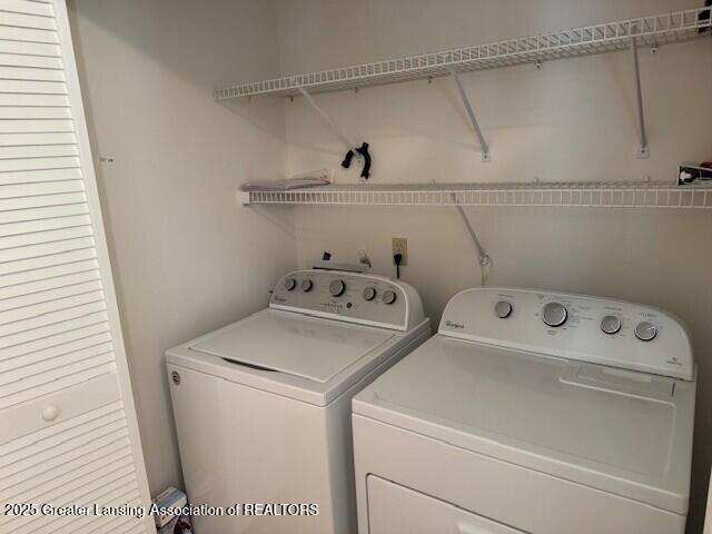 laundry area featuring laundry area and washing machine and dryer