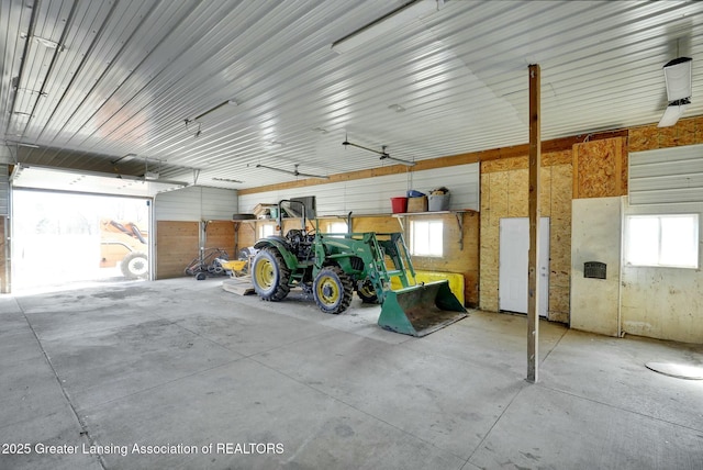 garage featuring metal wall