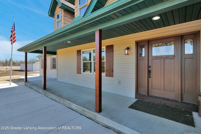 entrance to property with covered porch