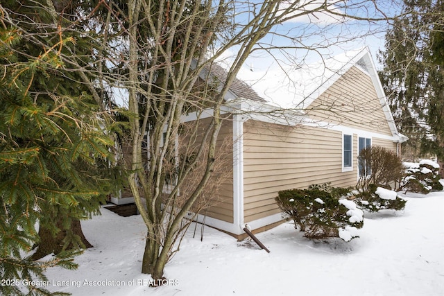 view of snow covered property