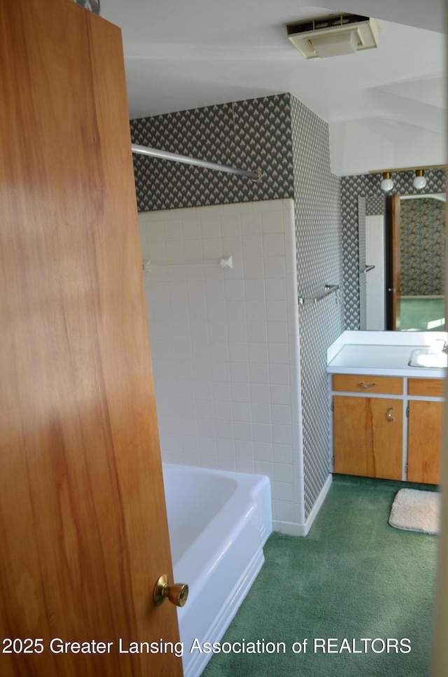 full bathroom with vanity and visible vents