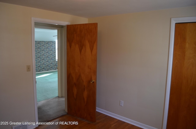 unfurnished bedroom with baseboards