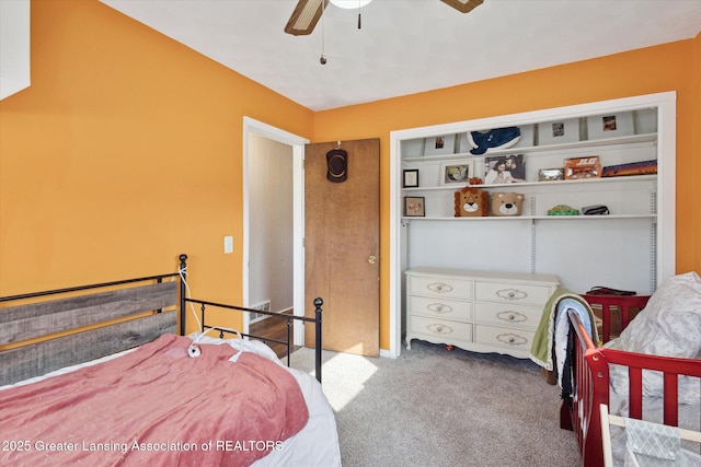 carpeted bedroom with ceiling fan