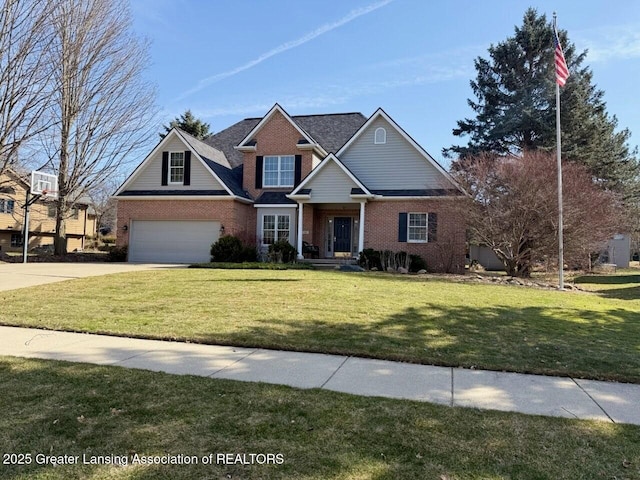 view of front of property featuring a garage, a front lawn, brick siding, and driveway