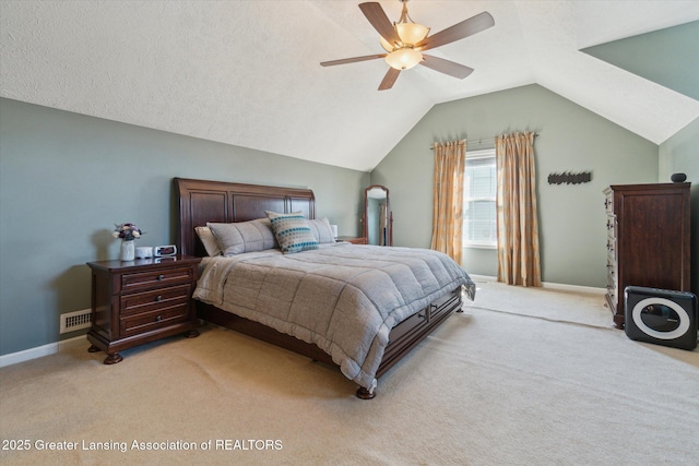 bedroom with baseboards, light carpet, a ceiling fan, and vaulted ceiling