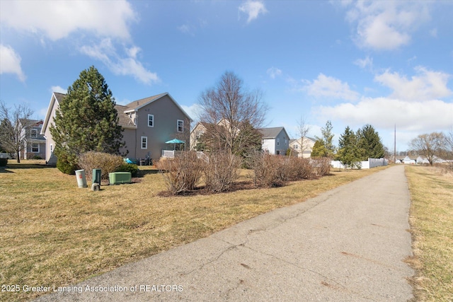 view of road with a residential view