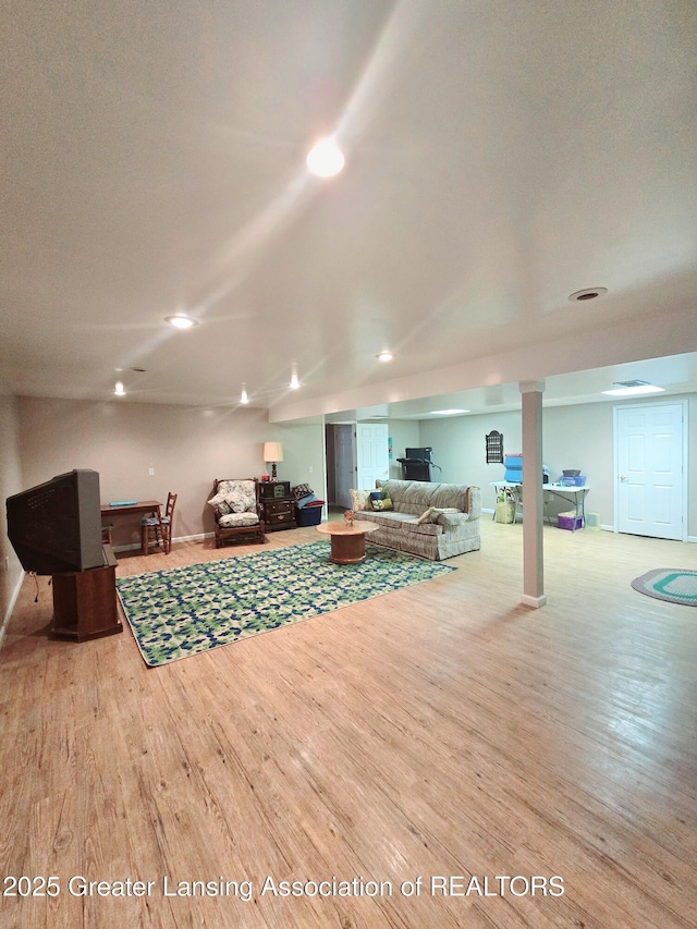 living area featuring wood finished floors and billiards