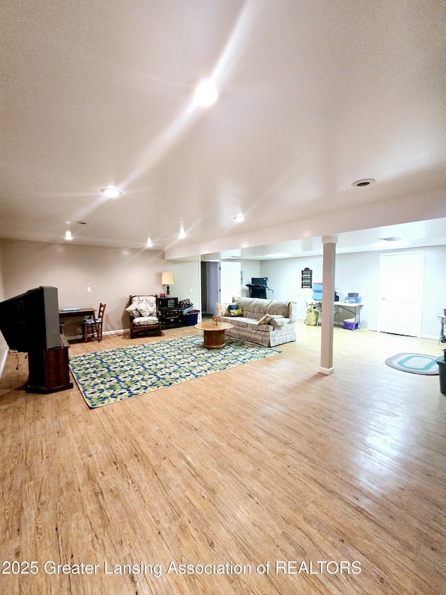 living area with wood finished floors