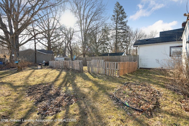 view of yard featuring fence