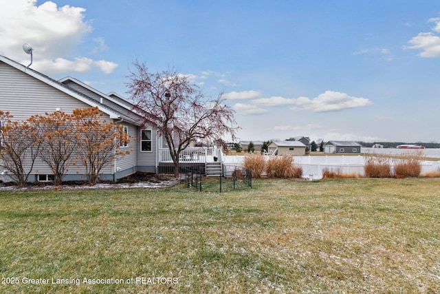 view of yard featuring fence