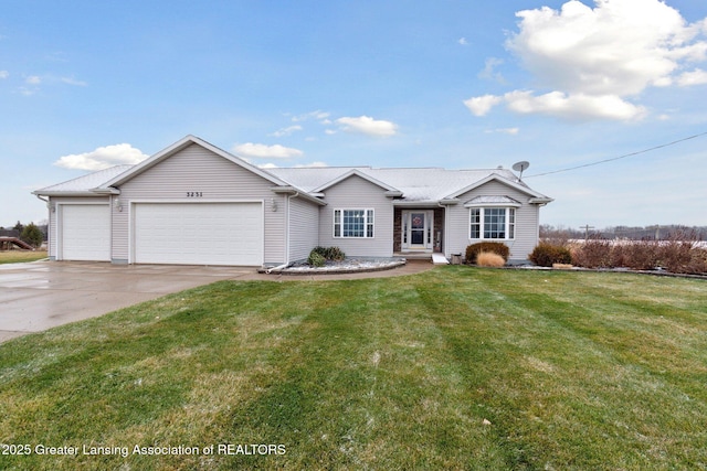 single story home featuring a front yard, an attached garage, and driveway