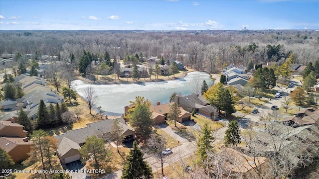 birds eye view of property with a forest view and a residential view