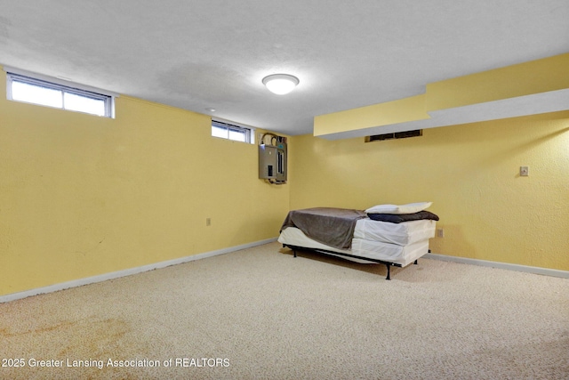 unfurnished bedroom featuring baseboards and carpet