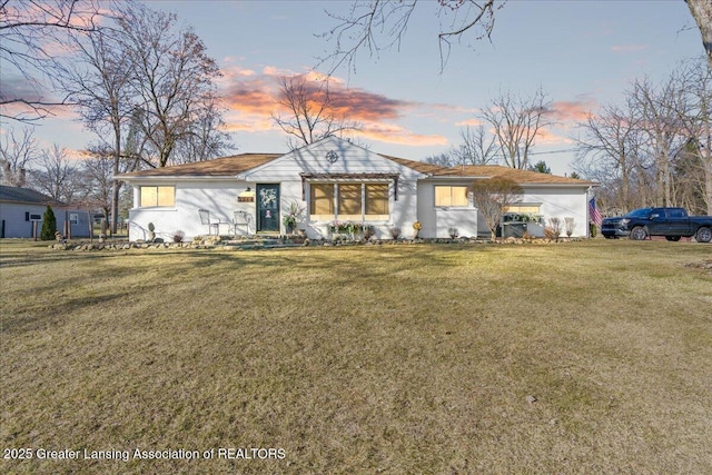 ranch-style home with a front yard