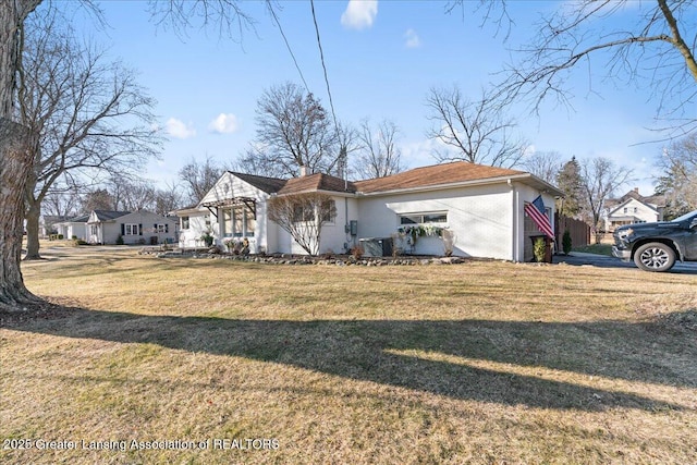 view of front of house with a front lawn and a chimney