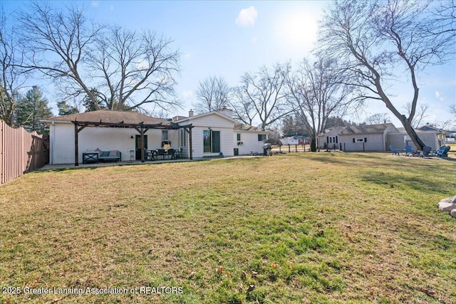 view of yard featuring a patio area and fence