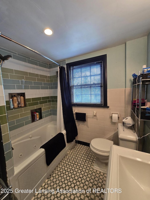 full bath with tile walls, recessed lighting, toilet, and a combined bath / shower with jetted tub