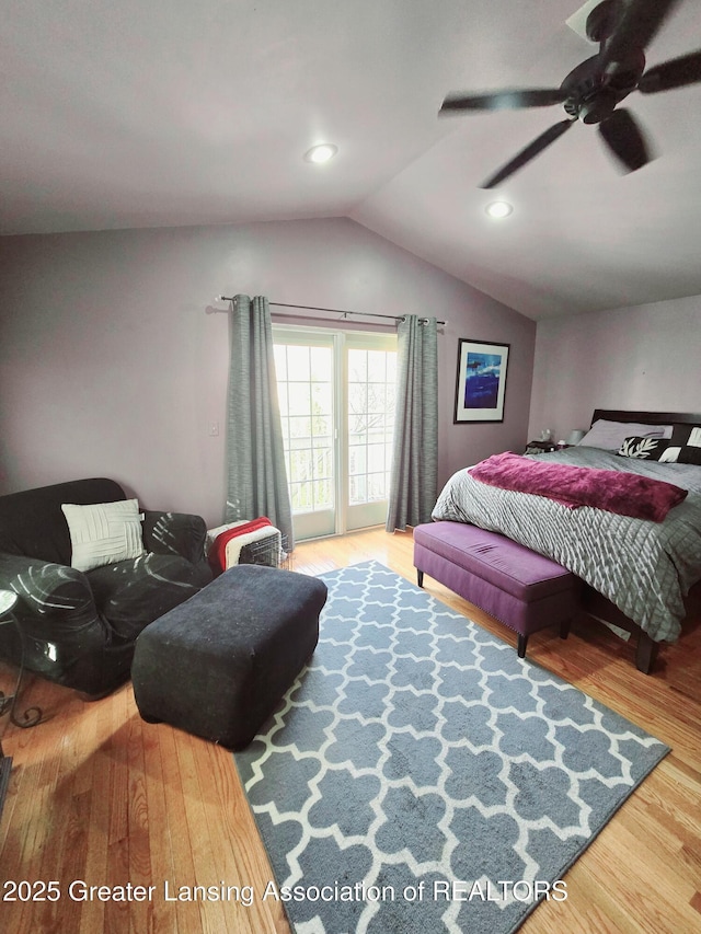 bedroom with access to exterior, ceiling fan, vaulted ceiling, recessed lighting, and wood finished floors